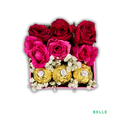 Belle: Six vibrant roses paired with delicate baby’s breath and Ferrero Rocher chocolates, beautifully arranged in a pink box.