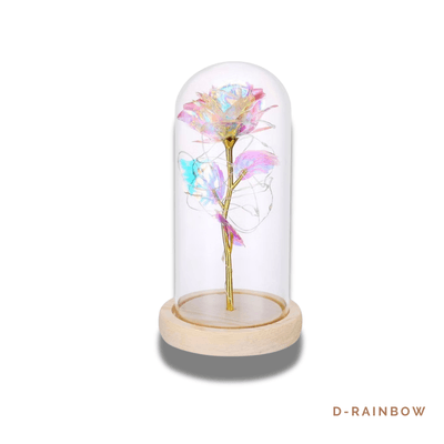 D-RAINBOW: Enchanting glass dome featuring a dazzling multicolored rose with golden accents and warm LED lights, symbolizing hope, joy, and everlasting love.