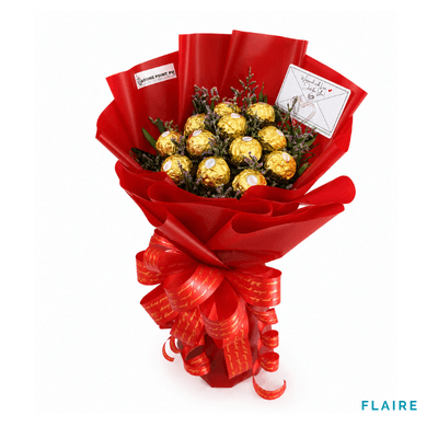 Flaire arrangement on a plain background: Luxurious bouquet of 12 Ferrero Rocher chocolates, beautifully arranged like golden blooms for a sweet and memorable gift.
