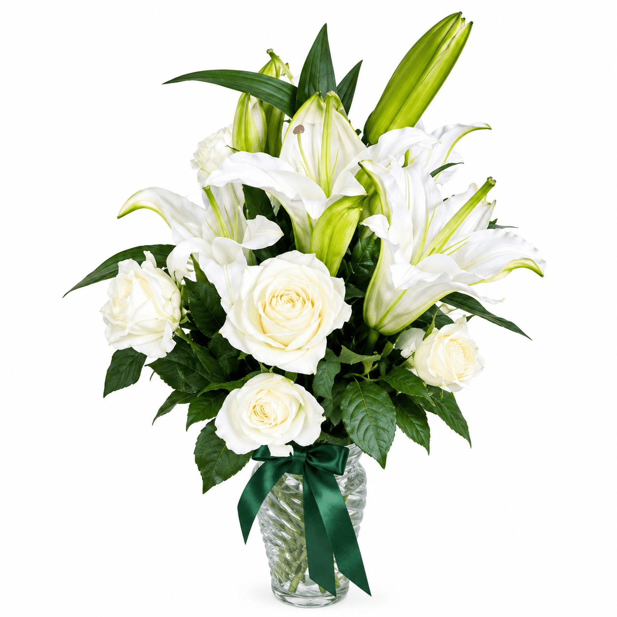 Glass Vase C: Round white mums beautifully arranged in a ribbed glass vase, symbolizing peace, remembrance, grace, and comfort.