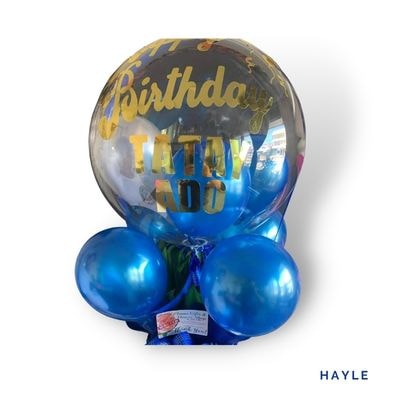 Hayle: Charming blue hot-air balloon arrangement, adding color, whimsy, and cheerful elegance to every special celebration.
