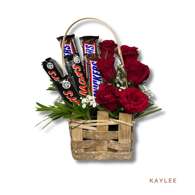 Kaylee: Charming basket of 6 roses with Snickers and Mars chocolates, perfect for expressing love and sweetness.