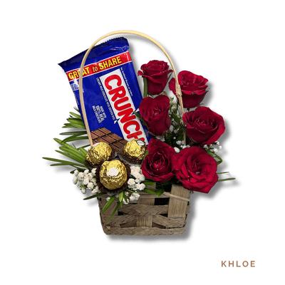 Khloe: Charming basket of 6 roses, Ferrero Rocher chocolates, and a Crunch bar—perfect for expressing love and sweetness.