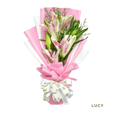 Lou arrangement on a plain background: Elegant bouquet of two vibrant lilies with bold pink petals and fragrant blooms, perfect for any occasion.
