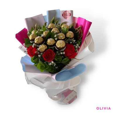 Olivia arrangement on a plain background: Delightful combination of 12 Ferrero Rocher chocolates and 3 deep red roses, perfect for expressing love and admiration.
