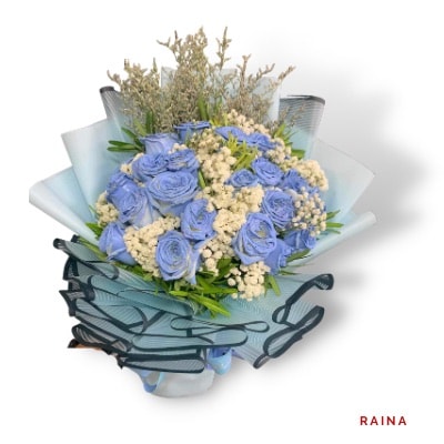 Raina: Fresh spray roses with a vibrant color effect, beautifully arranged for a unique and eye-catching bouquet.