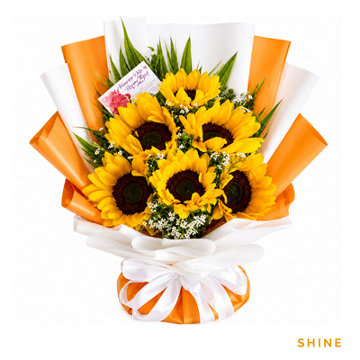 Shine arrangement on a plain background: Stunning bouquet of golden sunflowers radiating warmth and joy, perfect for expressing positivity and admiration.